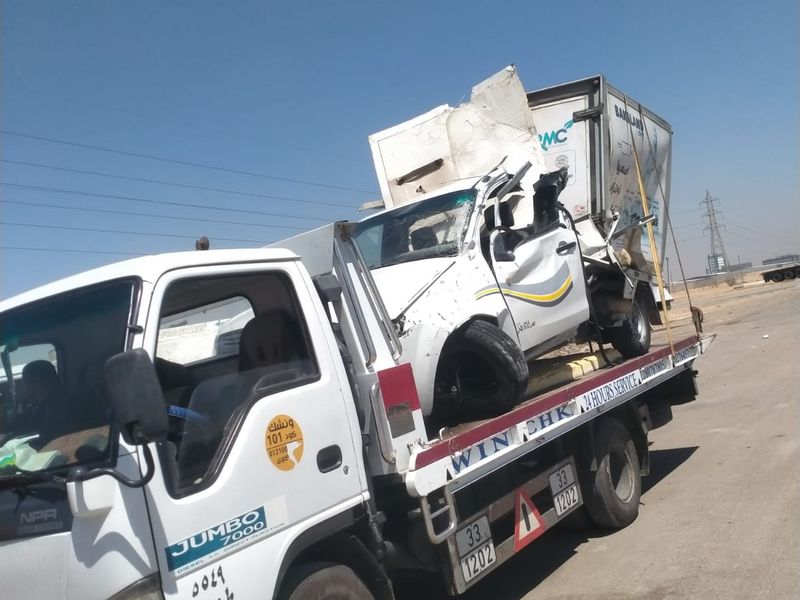 ونش ينقل سيارة بيك أب بيضاء مصدومة - الإسماعيلية